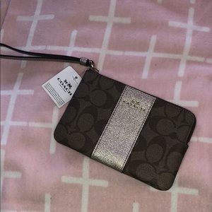 Coach PVC signature khaki & leather wristlet